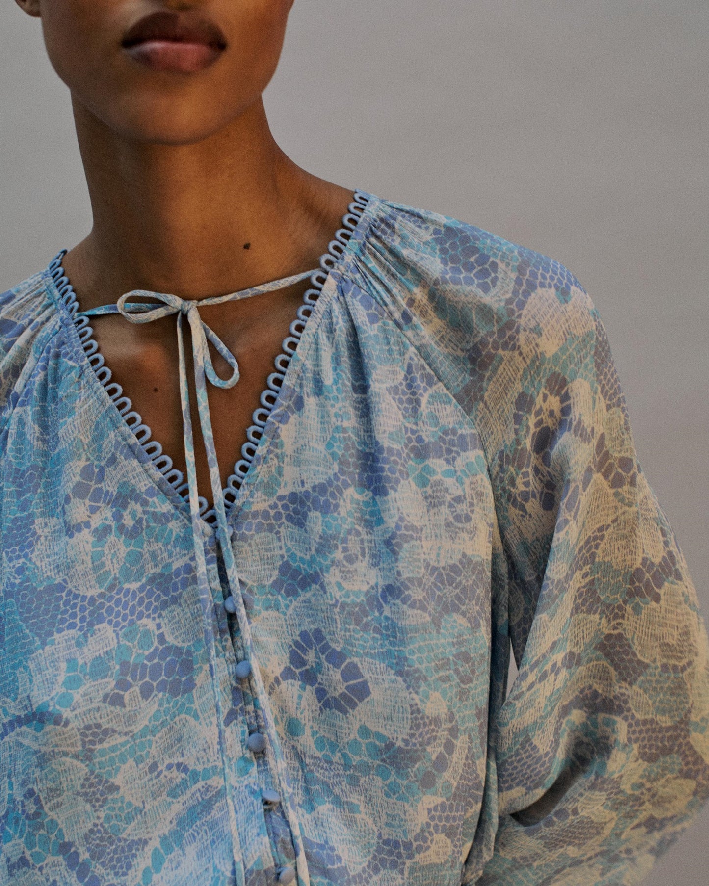 The Kaia Blouse in the Bluebell Lace Print