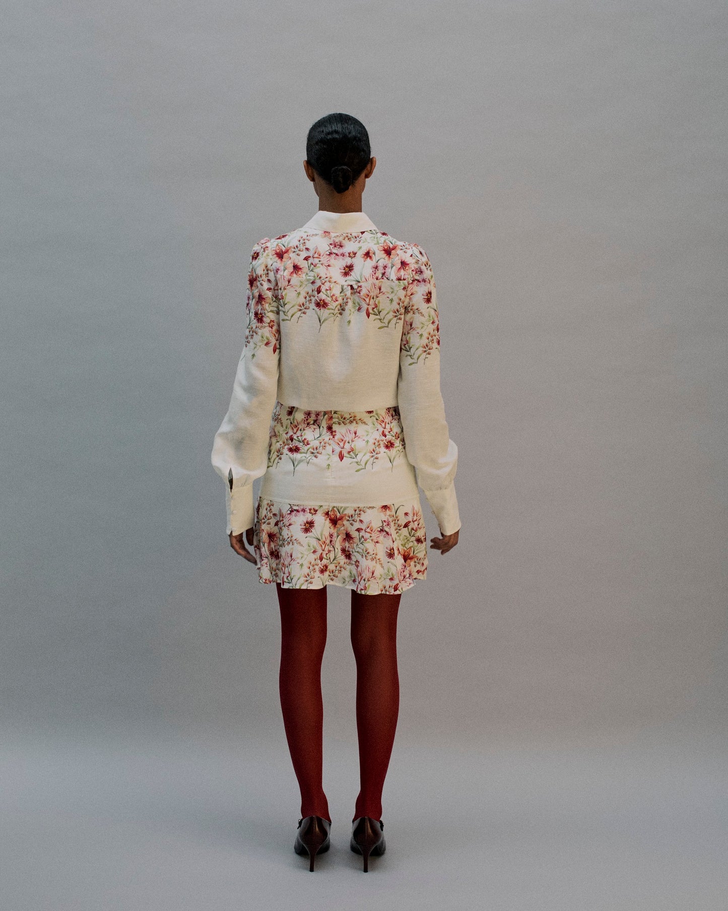 The Hailey Mini Skirt in The Garden Bloom Print